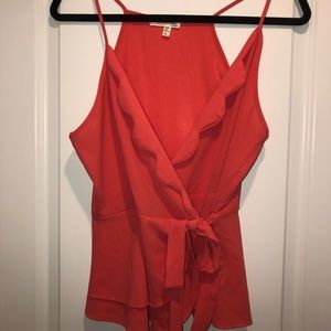 Super cute orange wrap top